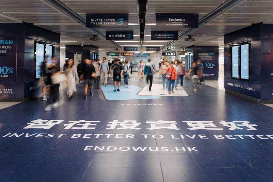 Endowus brand campaign in public transit – high-traffic advertising promoting digital wealth management and investment accessibility.